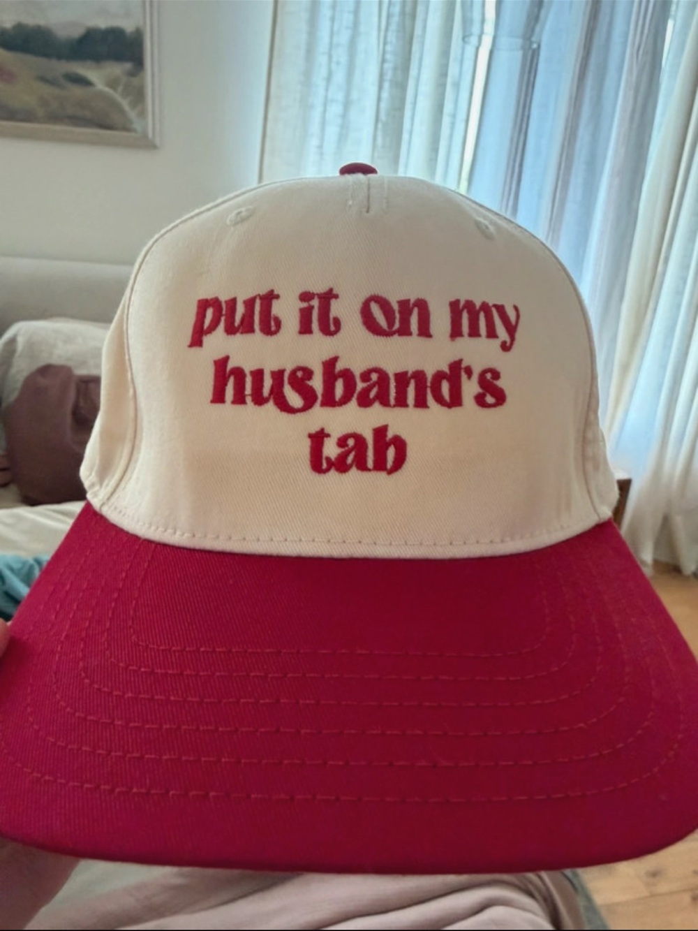Put It On My Husband's Tab White and Red Trucker Hat